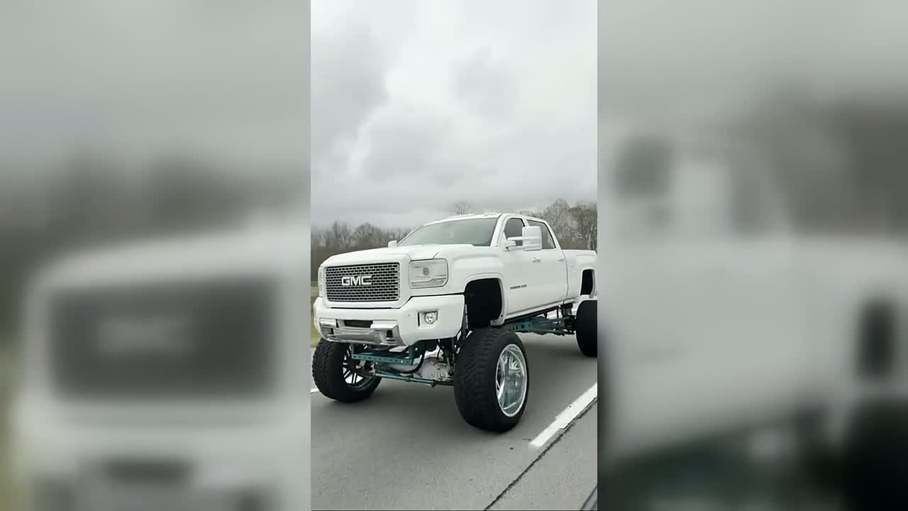 Lifted GMC Denali · Hero